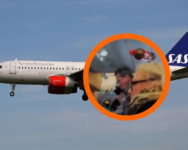 Samolot SAS Scandinavian Airlines na lądowanie. W okręgu widać pasażerów i personel pokładowy.